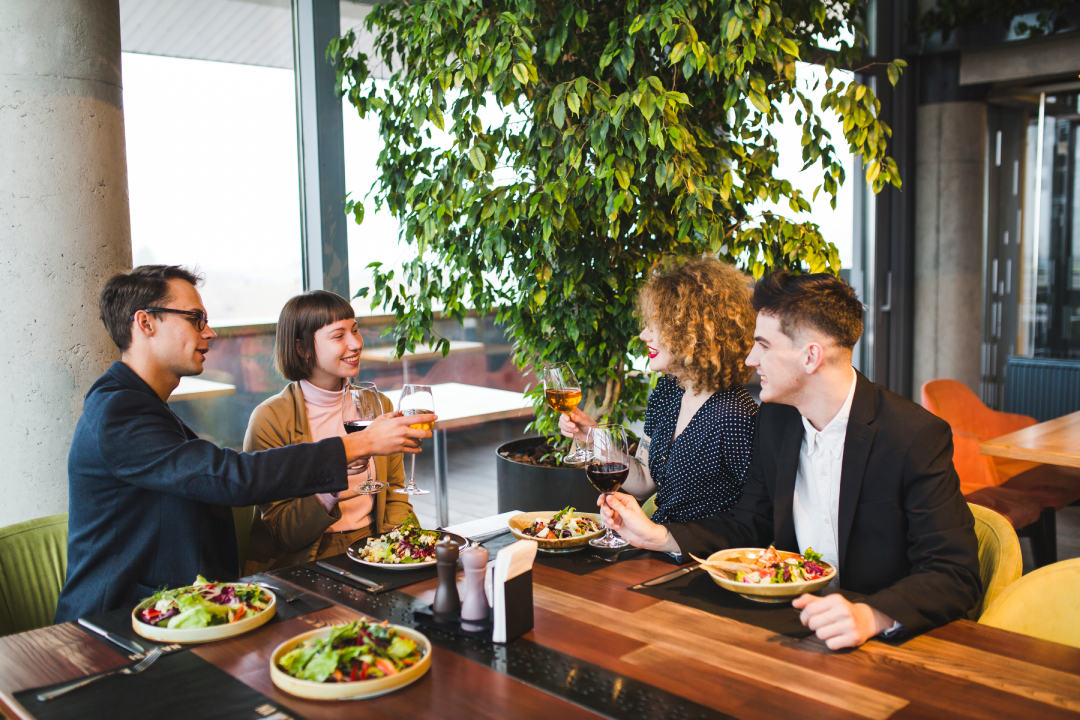 group-friends-eating-restaurant